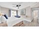 Bright primary bedroom features an ensuite bath and sliding glass door with backyard access at 930 S Dobson Rd # 41, Mesa, AZ 85202