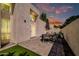 Enjoy outdoor living on this private patio with a dining set and lush green grass, perfect for entertaining at 930 S Dobson Rd # 41, Mesa, AZ 85202