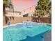 Backyard pool and spa with beautiful blue water at 9426 E Los Lagos Vista Ave, Mesa, AZ 85209