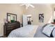 Cozy main bedroom featuring a ceiling fan, and neutral colored walls at 9537 E Flint Dr, Gold Canyon, AZ 85118