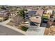 View of attractive two-story home featuring a tile roof, solar panels and a two-car garage at 15934 W Banff Ln, Surprise, AZ 85379