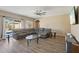 Comfortable living room features wood floors, neutral walls, and ample natural light at 15934 W Banff Ln, Surprise, AZ 85379