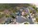 An aerial view of homes on a cul-de-sac that features mountain views and desert landscape at 1723 E Behrend Dr, Phoenix, AZ 85024