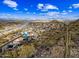 An aerial view shows the community near the freeway with scenic views at 1723 E Behrend Dr, Phoenix, AZ 85024