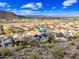 An aerial view shows the community near the freeway with scenic views at 1723 E Behrend Dr, Phoenix, AZ 85024