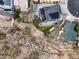 An aerial top-down view shows the backyard with a fire pit and lush landscaping at 1723 E Behrend Dr, Phoenix, AZ 85024