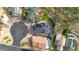 A view of the home showing a private pool, landscaped yard, and solar panels on the roof at 1723 E Behrend Dr, Phoenix, AZ 85024