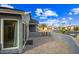 A large paved backyard patio with a mountain view offers ample space for outdoor entertaining and leisure at 1723 E Behrend Dr, Phoenix, AZ 85024