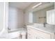 Clean bathroom featuring tile, bathtub, vanity, and modern fixtures at 1723 E Behrend Dr, Phoenix, AZ 85024