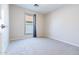 Cozy bedroom with neutral carpeting and a window for natural light at 1723 E Behrend Dr, Phoenix, AZ 85024