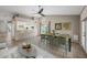 Open-concept dining area with views of the backyard and a convenient breakfast bar at 1723 E Behrend Dr, Phoenix, AZ 85024