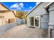 Cozy patio area offering seamless indoor-outdoor living with direct access to the home's interior at 1723 E Behrend Dr, Phoenix, AZ 85024