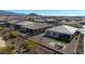 Aerial view of the community showing fenced yards, desert landscaping, and mountain views at 17878 W Amber Ridge Way, Goodyear, AZ 85338