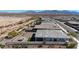 Aerial view showcasing the home and backyard patio and turf area at 17878 W Amber Ridge Way, Goodyear, AZ 85338