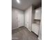 Convenient mud room with built-in storage and access to the entryway at 18243 W Larkspur Dr, Goodyear, AZ 85338