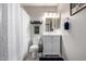 Neat bathroom featuring a shower, vanity, and toilet at 200 E Hess Ave, Coolidge, AZ 85128