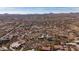 Desert neighborhood with various homes, roads, and native vegetation visible from above at 2070 W Bromm Ln, Wickenburg, AZ 85390