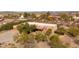 Aerial view of the home displaying its desert setting at 2070 W Bromm Ln, Wickenburg, AZ 85390