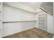 Walk in closet with carpet, shelving, and hanging storage at 2070 W Bromm Ln, Wickenburg, AZ 85390