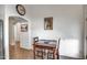 Cozy breakfast nook with seating for two, bathed in natural light from surrounding windows at 214 N 222Nd Dr, Buckeye, AZ 85326