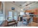 Bright kitchen featuring stainless steel appliances, light countertops, and a kitchen island with seating at 214 N 222Nd Dr, Buckeye, AZ 85326