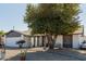 Charming single-story home featuring desert landscaping and a well-maintained front yard at 2143 W Eugie Ave, Phoenix, AZ 85029