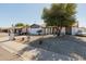 Charming single-story home featuring desert landscaping and a well-maintained front yard at 2143 W Eugie Ave, Phoenix, AZ 85029