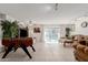 Spacious living room featuring tile floors and classic furnishings at 2143 W Eugie Ave, Phoenix, AZ 85029