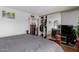 Inviting bedroom featuring a mirrored closet, wood floors, dresser and contemporary decor at 2143 W Eugie Ave, Phoenix, AZ 85029