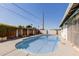 A refreshing swimming pool with clear blue water surrounded by a concrete patio at 2143 W Eugie Ave, Phoenix, AZ 85029