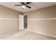 Neutral bedroom showcasing ceiling fan, carpet, and fresh, neutral paint at 2190 W San Tan Hills Dr, San Tan Valley, AZ 85144