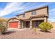 A two-story home featuring a red garage door and a tile roof at 2190 W San Tan Hills Dr, San Tan Valley, AZ 85144