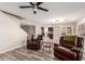 Bright living room with hardwood floors, recessed lighting, and an open floor plan at 2190 W San Tan Hills Dr, San Tan Valley, AZ 85144