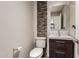 Modern powder room with designer tile accent wall, toilet and sink vanity at 2190 W San Tan Hills Dr, San Tan Valley, AZ 85144