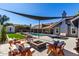 Stunning backyard with a pool, spa, fire pit, and outdoor seating area at 2237 N Kachina --, Mesa, AZ 85203