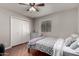 Inviting bedroom featuring wood floors, closet, and a bright window at 2237 N Kachina --, Mesa, AZ 85203