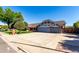 Spacious home with a wide driveway leading to a two-car garage, perfect for Gathering living at 2237 N Kachina --, Mesa, AZ 85203