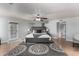 This main bedroom features a large rug, hardwood floors and private entrance to the backyard at 2237 N Kachina --, Mesa, AZ 85203