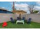 Enjoy the outdoors in this cozy backyard space with comfortable seating and a privacy fence at 2246 E Sheridan St, Phoenix, AZ 85006