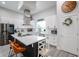 Bright kitchen with stainless steel appliances, quartz countertops, and white cabinetry at 2246 E Sheridan St, Phoenix, AZ 85006