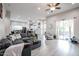 Spacious open-concept living room seamlessly flowing into the kitchen and dining area at 2246 E Sheridan St, Phoenix, AZ 85006