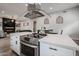 Open-concept living space with a modern kitchen and dining area at 2246 E Sheridan St, Phoenix, AZ 85006