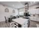 Open-concept living space with a kitchen and dining area with plank flooring at 2246 E Sheridan St, Phoenix, AZ 85006