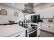 Open-concept living space with a modern kitchen and dining area at 2246 E Sheridan St, Phoenix, AZ 85006