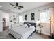 Bright main bedroom with a ceiling fan and neutral tones, creating a relaxing atmosphere at 2246 E Sheridan St, Phoenix, AZ 85006