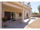 Backyard view highlighting the covered patio, balcony, and easy-care landscaping at 26234 N 46Th St, Phoenix, AZ 85050