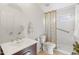 Bathroom featuring walk-in shower, vanity, and round mirror at 26234 N 46Th St, Phoenix, AZ 85050