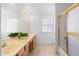 Bathroom with tiled floor, double sinks and a shower at 26234 N 46Th St, Phoenix, AZ 85050