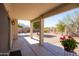 Covered patio overlooking a landscaped backyard, creating a perfect outdoor retreat at 26234 N 46Th St, Phoenix, AZ 85050