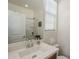 Bright bathroom featuring a single sink vanity and walk-in shower at 2673 S Balsam Dr, Gilbert, AZ 85295